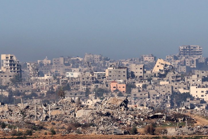 Des bâtiments détruits après une frappe aérienne des forces israéliennes dans le nord de la bande de Gaza, depuis Sderot, en Israël. © KEYSTONE/EPA/ABIR SULTAN
